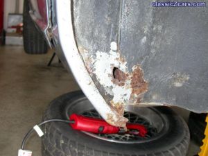 Small Hole in wheel well behind rocker