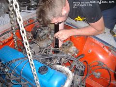 Rich putting his rebuilt engine in...