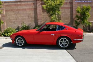 red 240z in parking lot 2