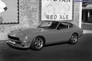 red 240z in black and white 2