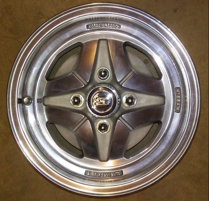 4-73 Nissan's first alloy rim.JPG