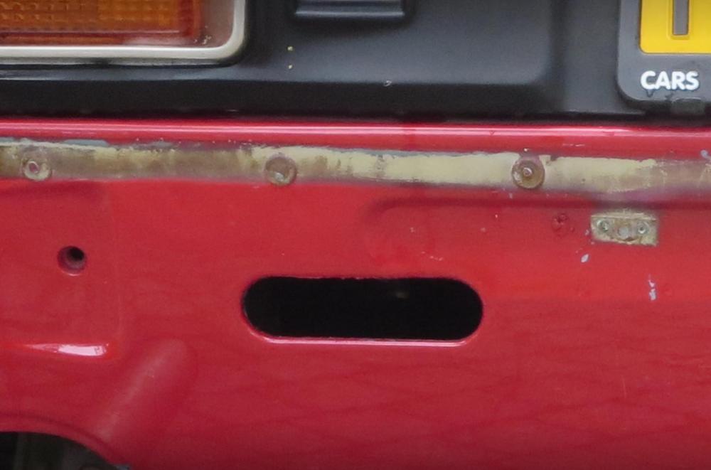 Rear bumper shield dimple in body panael.jpg