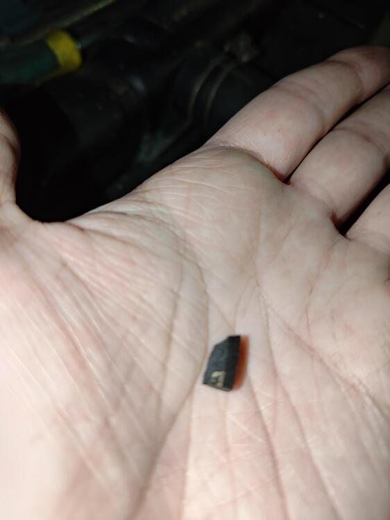 Piece of loose plastic in distributor.jpg